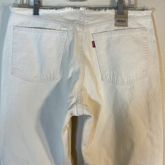 NWT. Levi’s Short Button Fly Low Rise Wedge Straight Distressed White Jeans. 12. - Picture 10 of 11